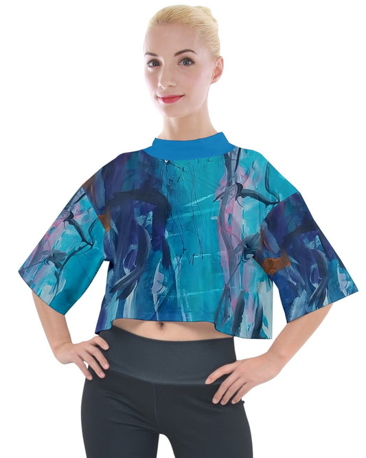 Front view of a vibrant top featuring original artwork by Leeorah. The design is bold and alluring, with intricate details that captivate the eye. The fabric appears soft and stretchy, promising both comfort and style. Perfect for dancing, it exudes confidence and allure, inviting movement and self-expression