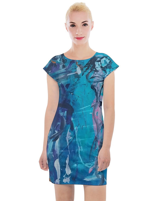  A blue day dress with a vibrant, original art print by Leeorah, designed to flatter all sizes. The dress features a relaxed silhouette and soft fabric, promising comfort and style for any occasion. Front view