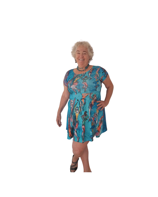  A plus size  blue day dress with a vibrant, original art print by Leeorah, designed to flatter all sizes. The dress features a relaxed silhouette and soft fabric, promising comfort and style for any occasion. Front view